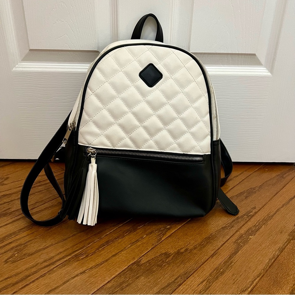 Claire’s Faux Leather White & Black Quilted Mini Backpack